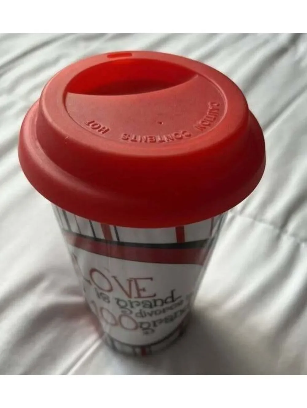 DRINKWARE Ceramic Travel Coffee Mug with Red Silicone Lid and Artistic Design